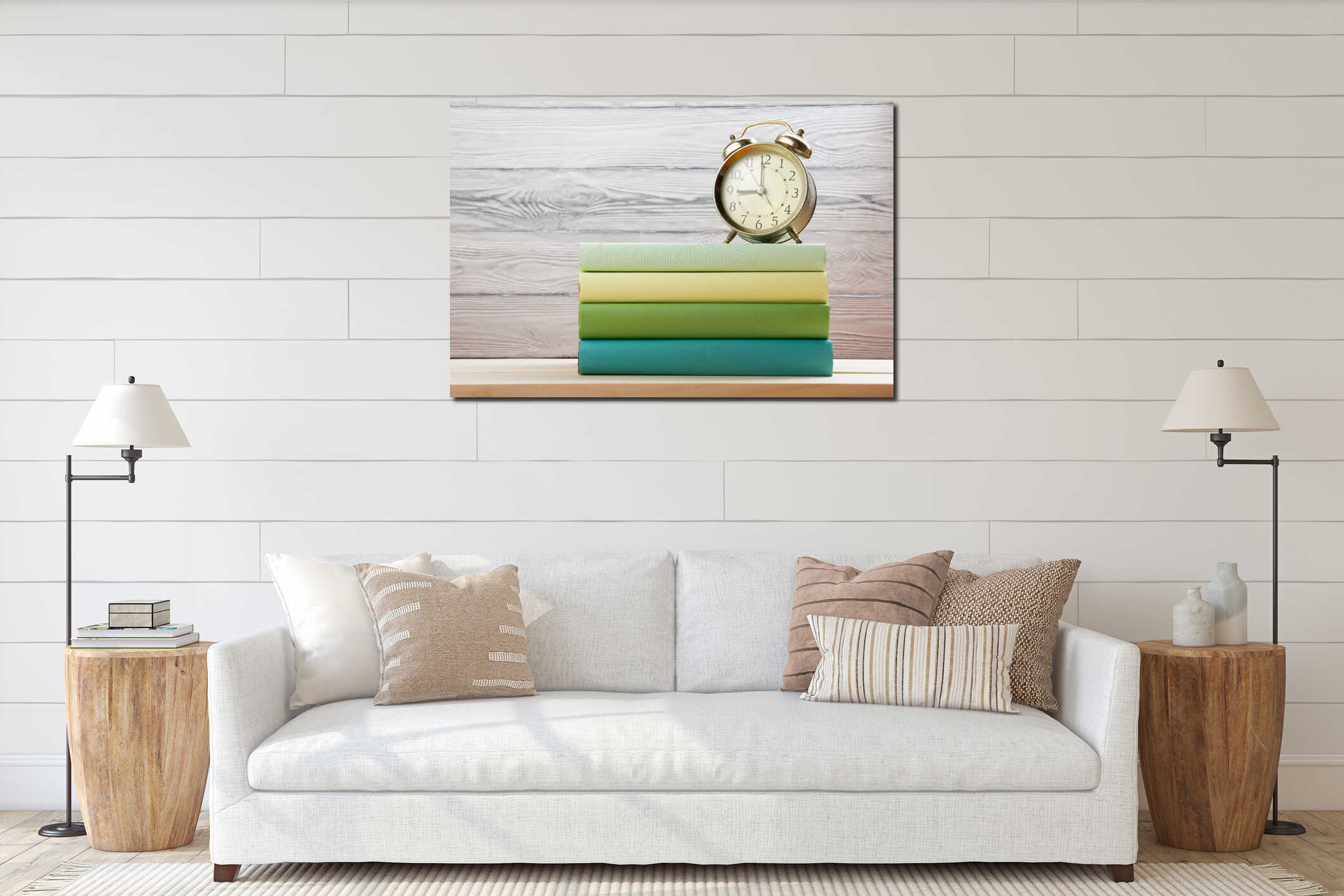 Stack of colorful books and alarm clock on wooden table. Back to school. Copy space interior mockup