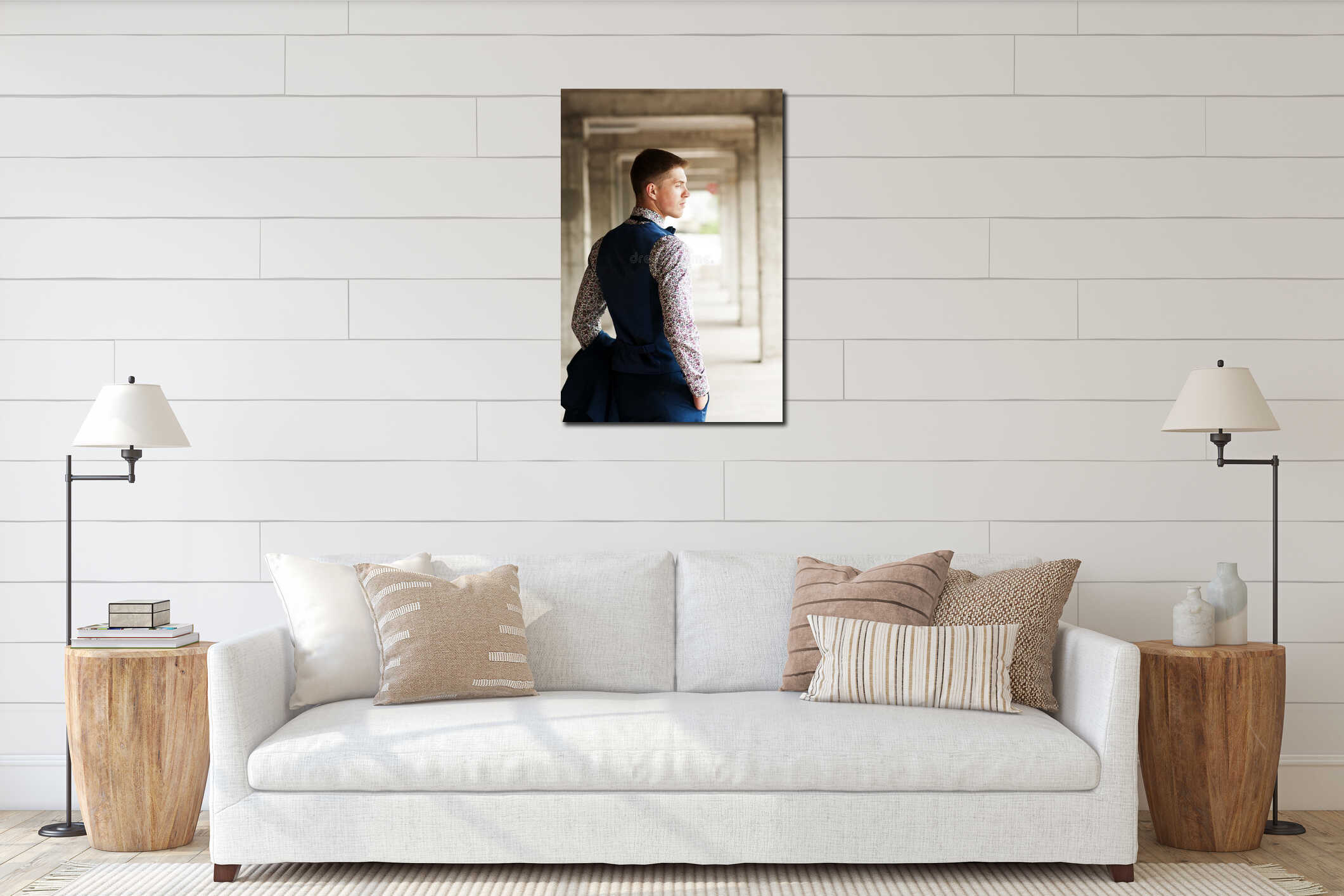 Rear view of a young handsome man in a flower shirt and vest. interior mockup