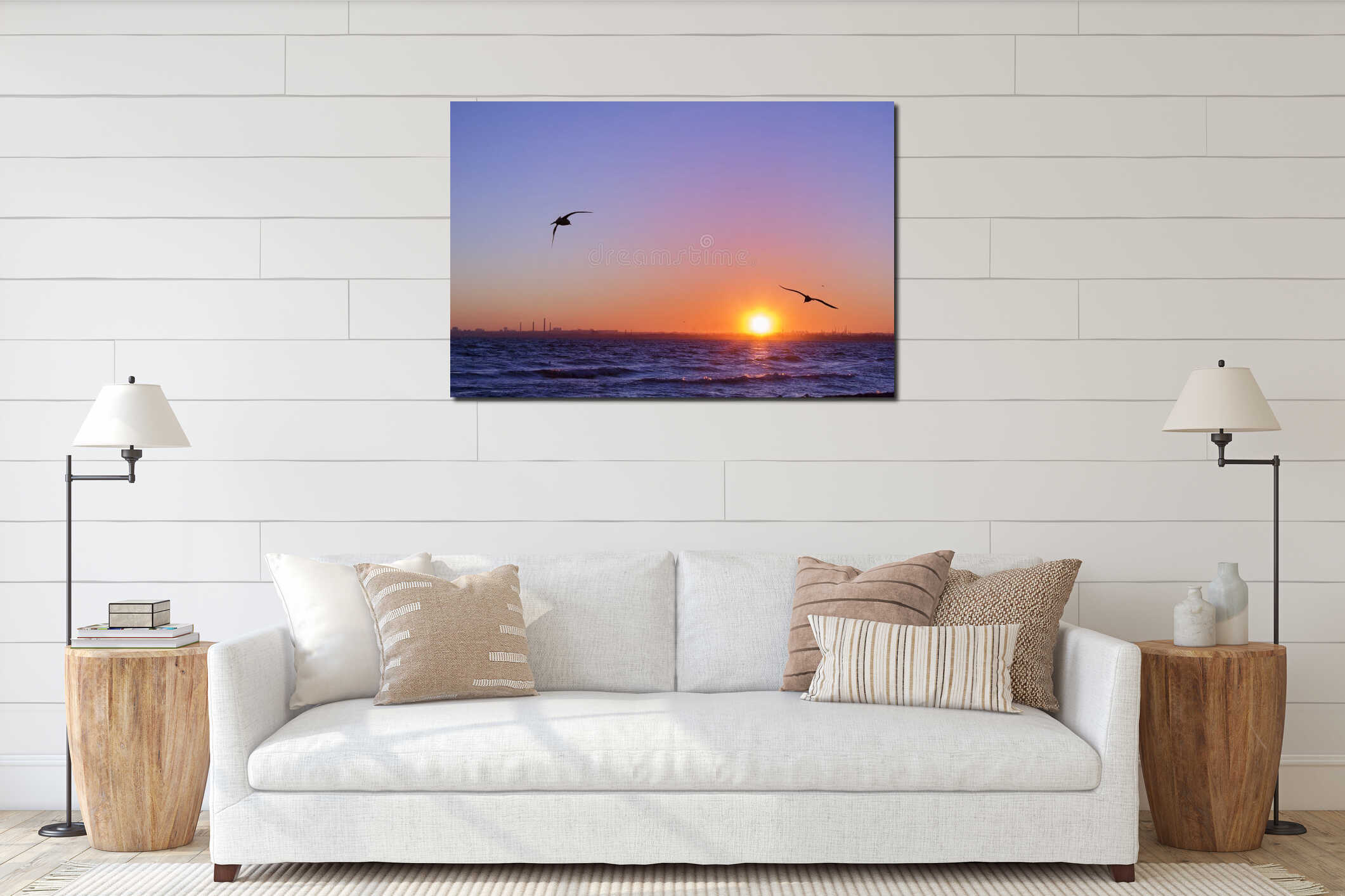 Sunset. Birds silhouettes, sun and the sea interior mockup
