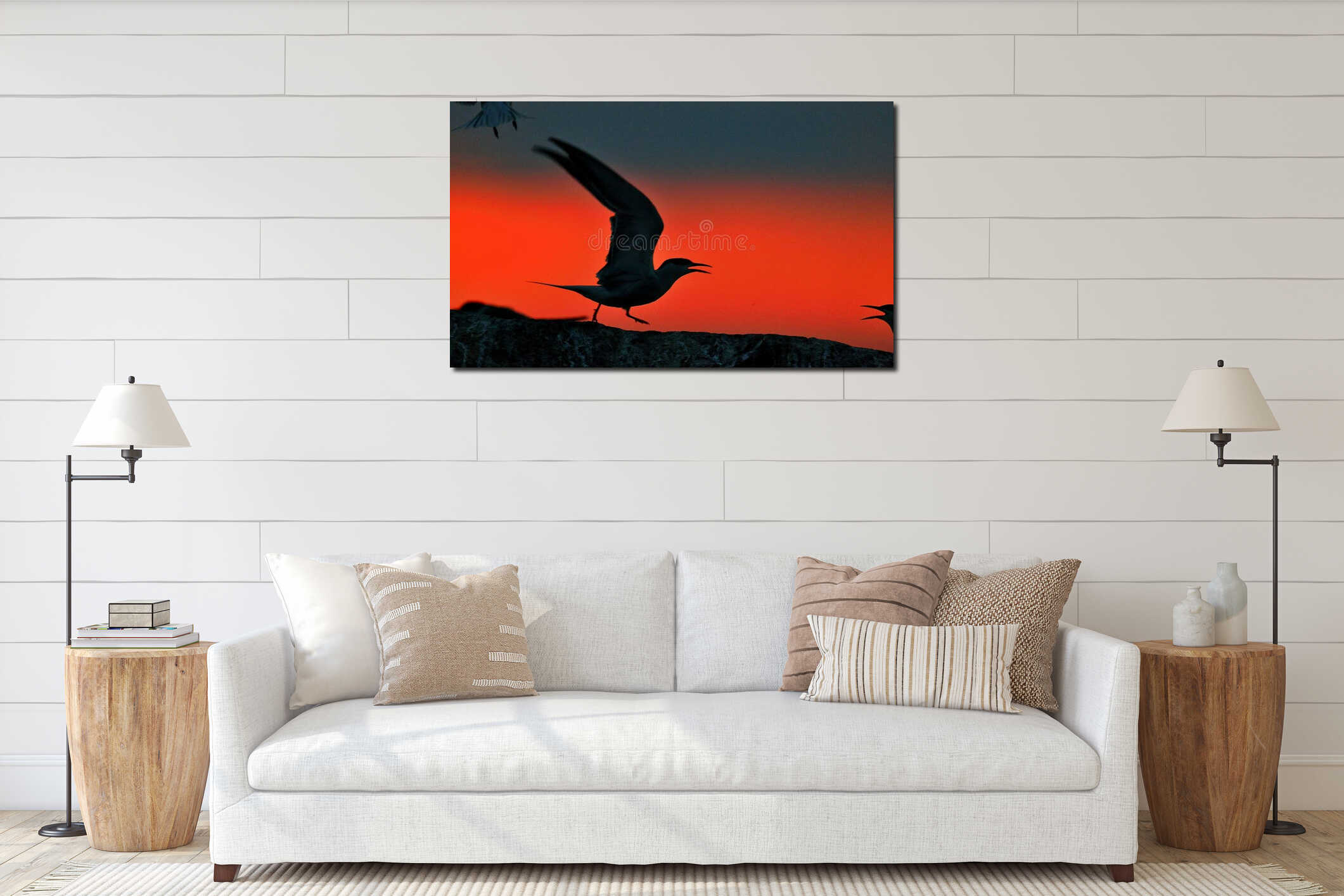 Silhouette of Common Terns (sterna hirundo) on red sunset background interior mockup