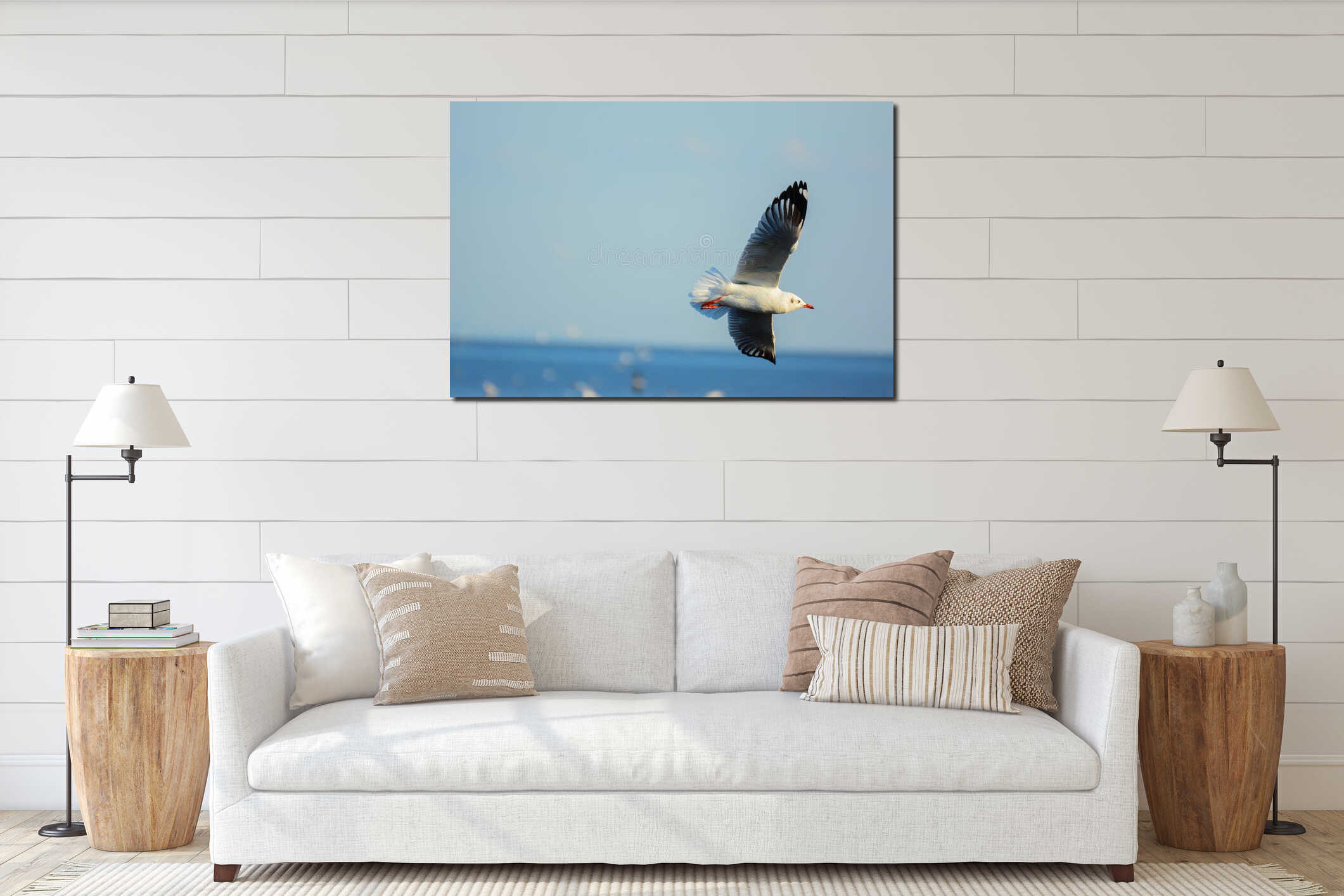 Seagull is gliding over the sea. interior mockup