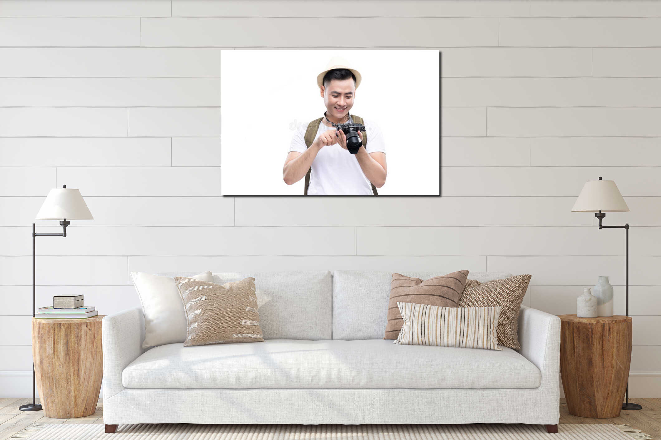 Travel concept. Studio portrait of handsome young man in hat wit interior mockup
