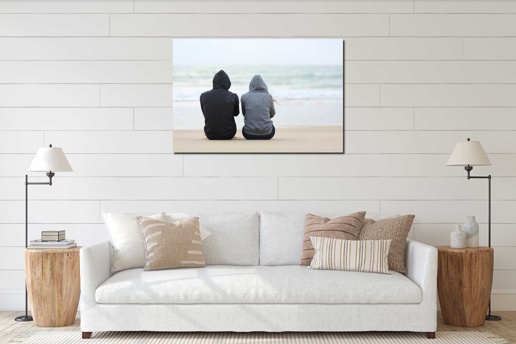 Two sad teenagers sitting on the beach interior mockup