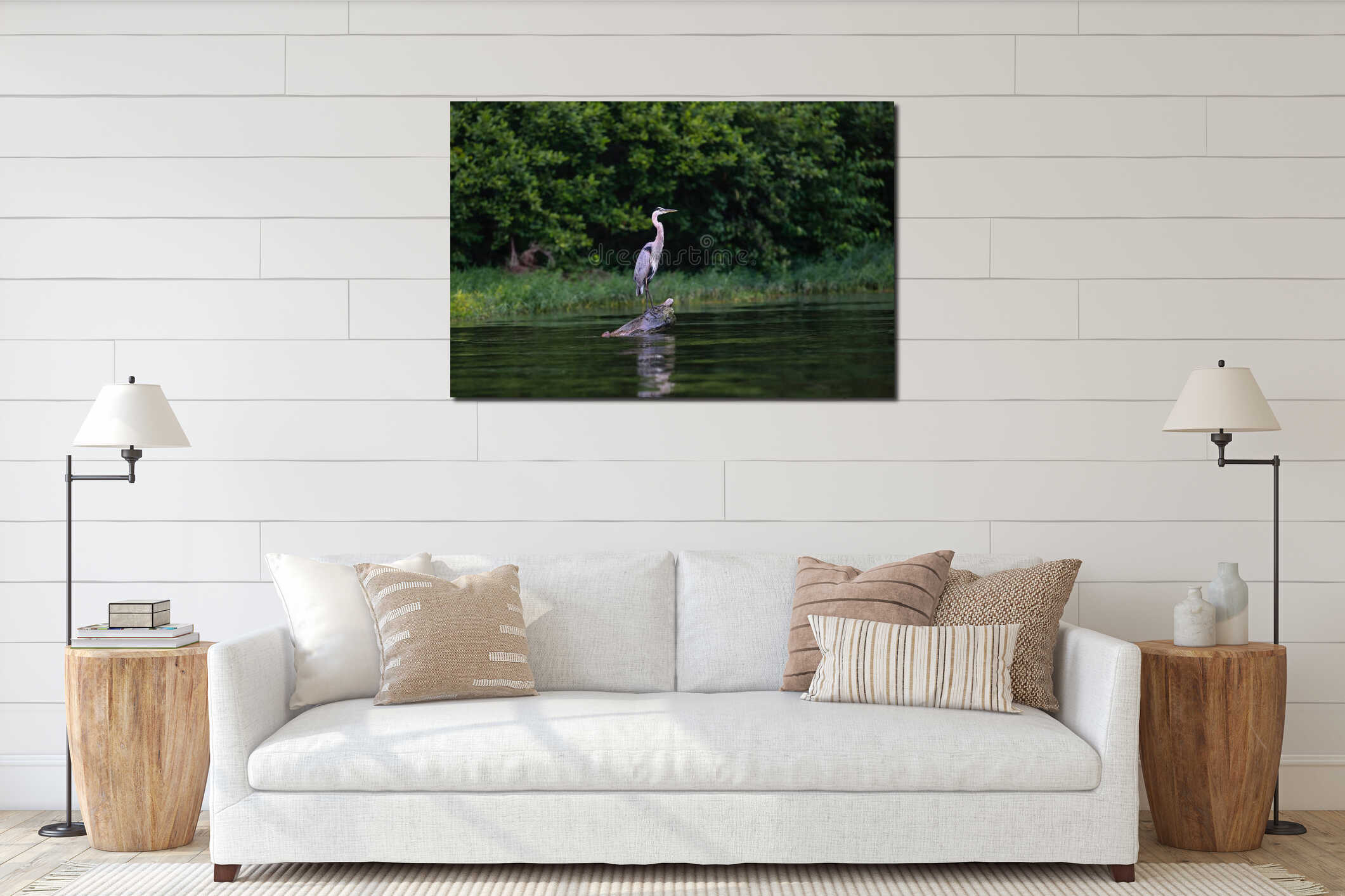 Great Blue Heron bird on log at the lake interior mockup