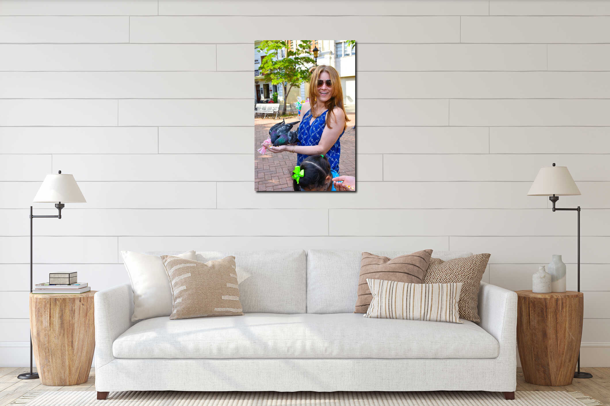 Santo Domingo, Dominican Republic. Woman feeds pigeons on Columbus Park, Colonial Zone of Santo Domingo. interior mockup