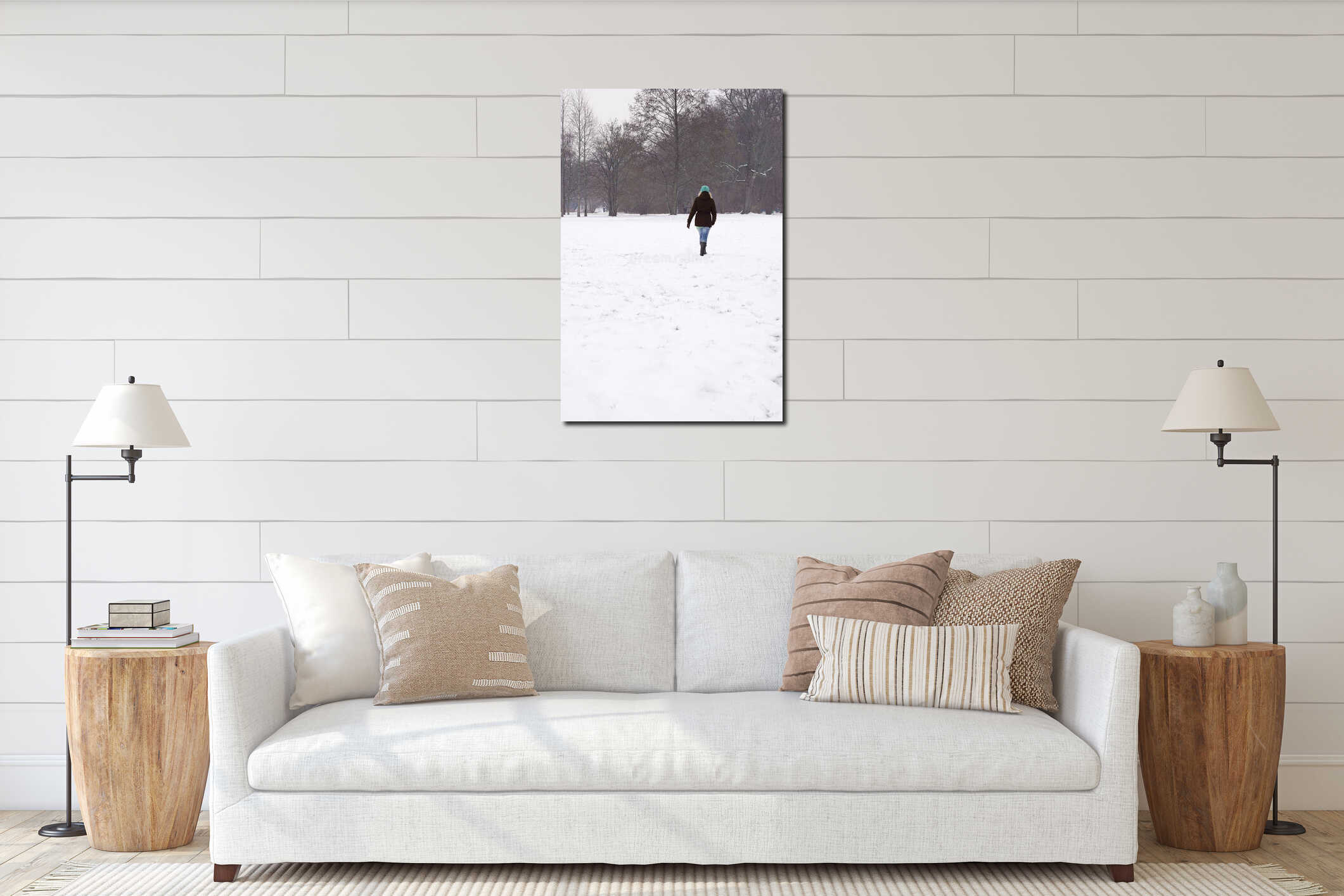 Woman walking across snow covered field interior mockup