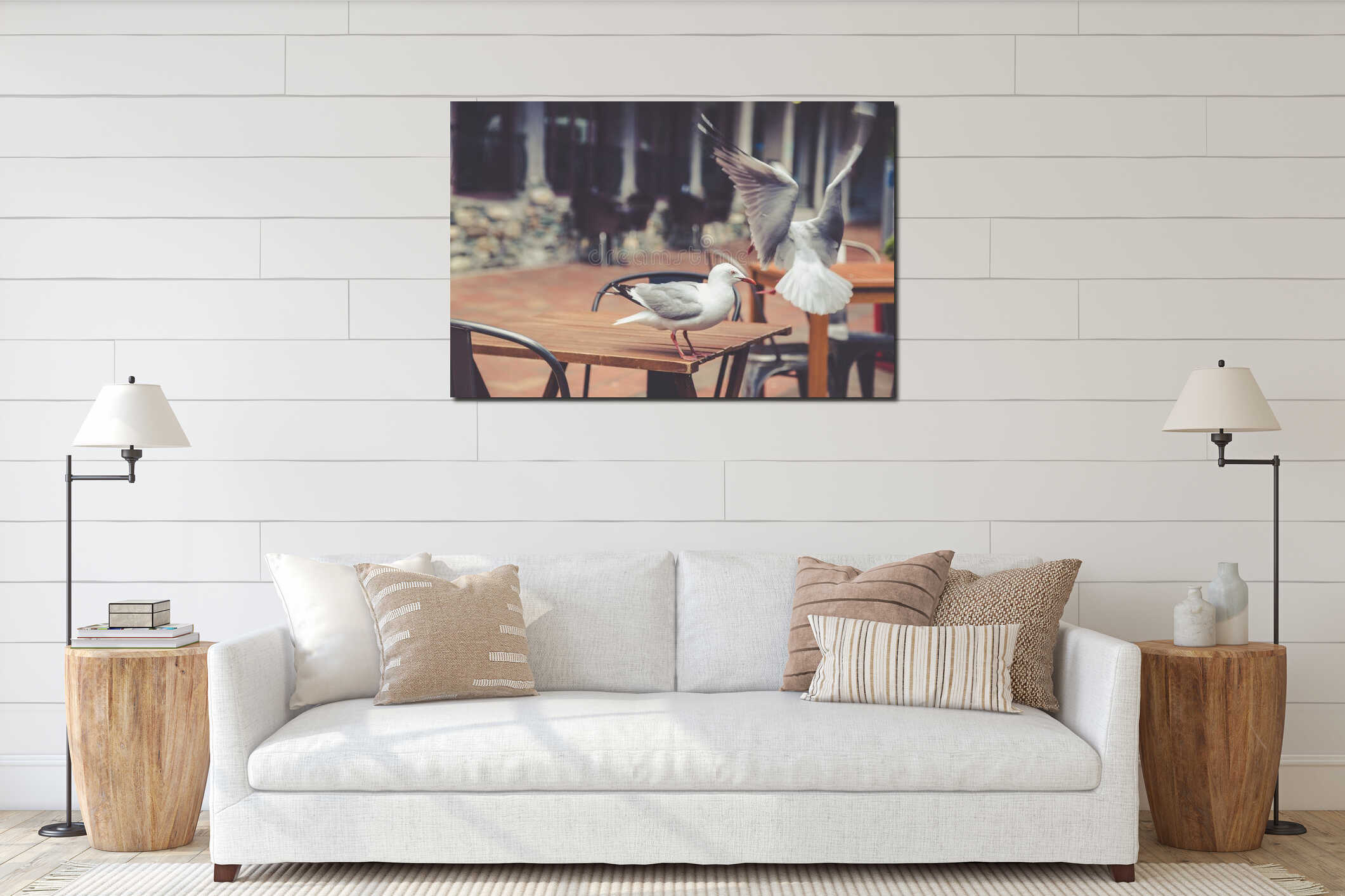 Two seagulls at the wooden outdoor street cafe table with black chairs interior mockup
