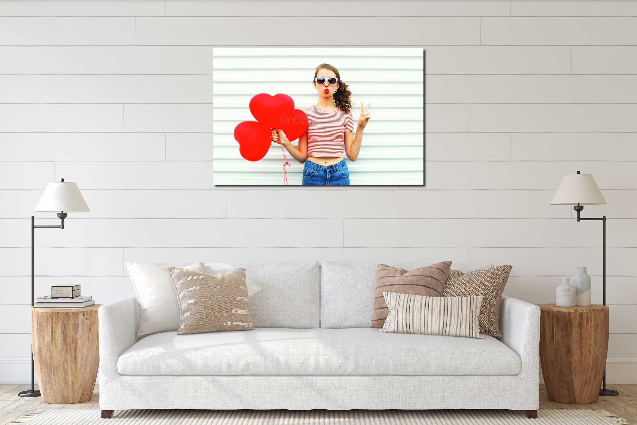 Portrait cute woman making air kiss with red balloons heart shape over white interior mockup