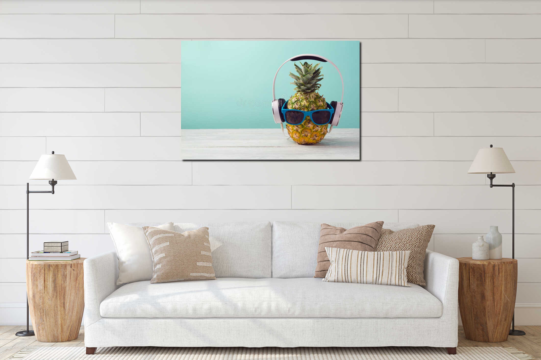 Pineapple with headphones and sunglasses on wooden table over mint background. Tropical summer vacation and beach party. interior mockup