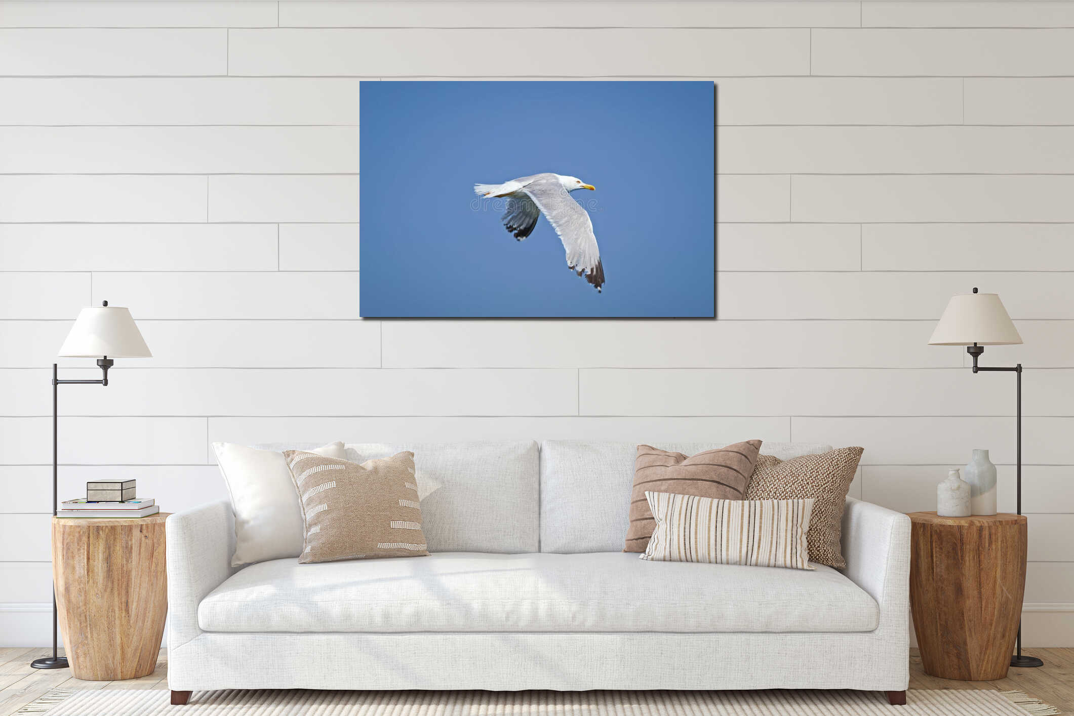 Seagull flying in a clear blue sky interior mockup