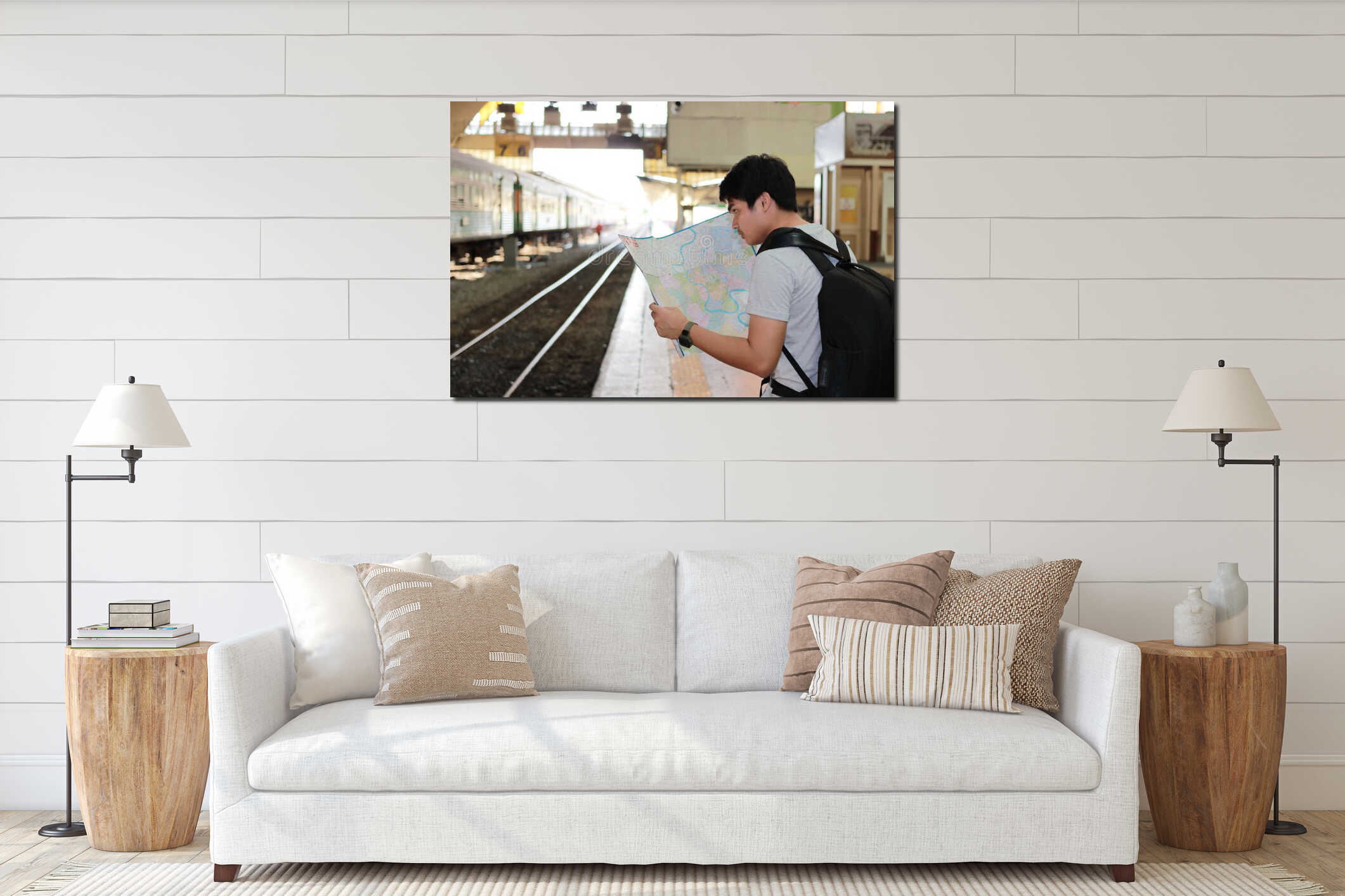 Rear view of handsome young Asian tourist exploring the map for right direction at the train station. Travel and tourism concept. interior mockup
