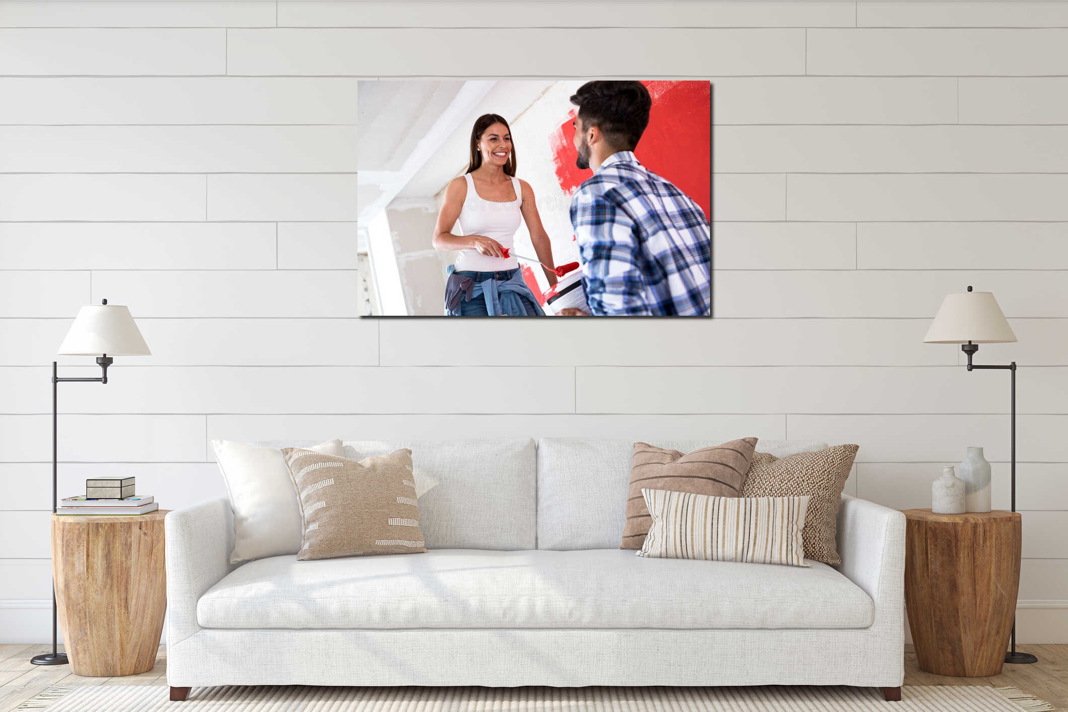 Young couple painting walls in their new house interior mockup